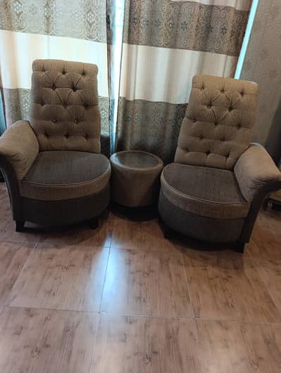 Two chairs with table