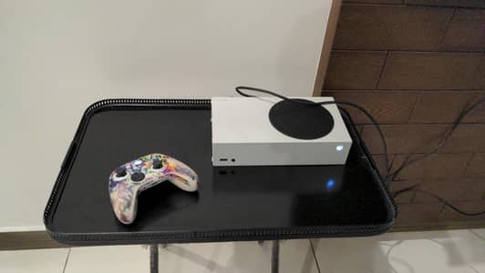 Xbox console with two remote