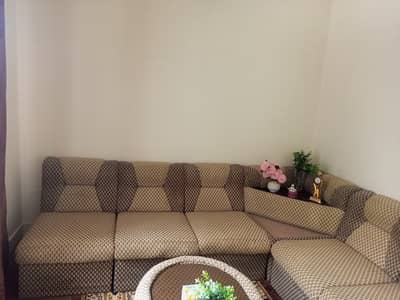 L shape sofa seater with table and side corner