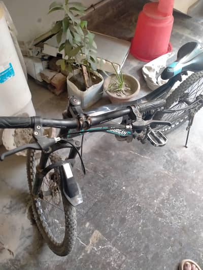 biycycle with good condition with one Bluetooth headphone wireless and