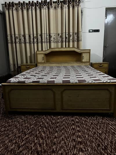Double bed with side tables and dressing