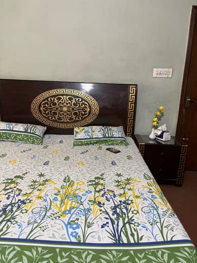 bed without mattress with 2 side tables , dressing with mirror ,