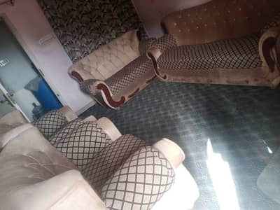 7 seater sofa set in good condition with sofa cover