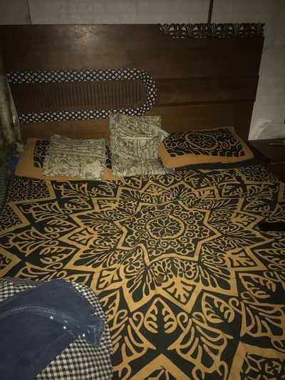 Bed and cupboard