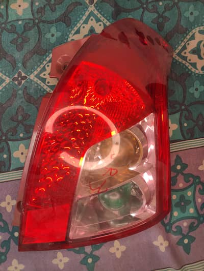 Suzuki swift Back light One piece (driver side condition 10/9.5)