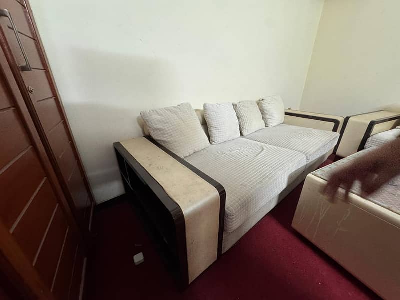 white colored comfortable sofa 1