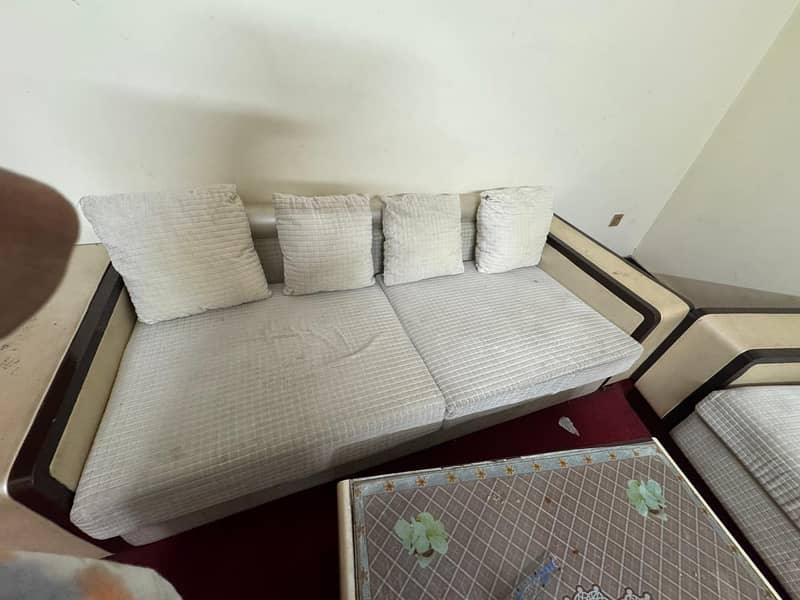 white colored comfortable sofa 2