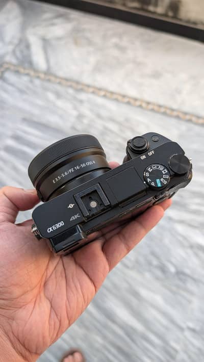 Sony a6300 with 16-50 kit lens (brand new lens)