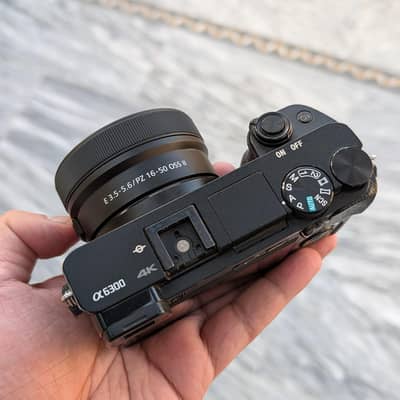 Sony a6300 with 16-50 kit lens (brand new lens)