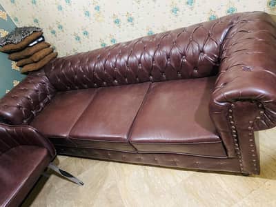 sofa with chairs