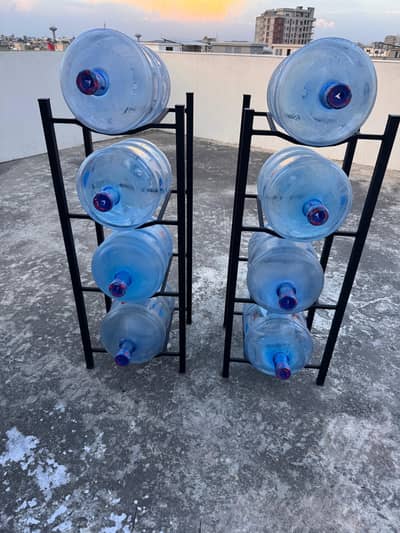 Nestle 9 bottels and 2 stands for sale good condition