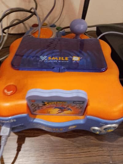 VTech smile educational learning game console.