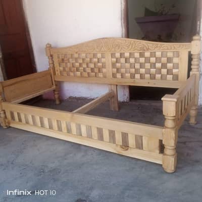 wooden double beds and dressing