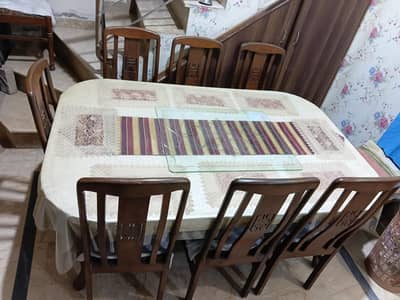 Wooden Dining Table with 8 Chairs.