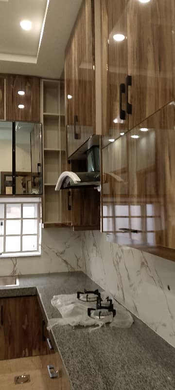 10 Marla Brand New Triple Story In UMER block Iqbal Town Lahore