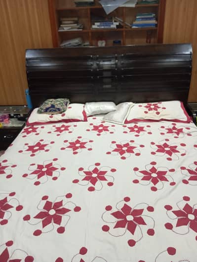 Bed with side tables