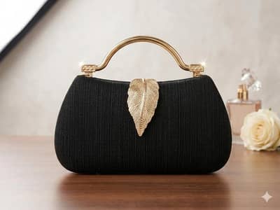 The Autumn Leaf Metallic Handle Pouch