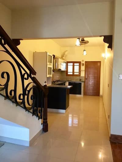100 YARDS MOST LUXURIOUS AND ARCHITECTURE ULTRA MODERN STYLE DOUBLE STORY BUNGALOW FOR RENT IN DHA PHASE 7 EXT. MOST ELITE CLASS LOCATION IN DHA KARACHI