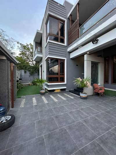 500YARDS MOST LUXURIOUS AND ARCHITECTURE ULTRA MODERN STYLE DOUBLE STOREY BUNGALOW FOR SELL IN DHA PHASE 7 EXT. MOST PRIME LOCATION IN DHA KARACHI. TWO SIDES CORNOR BUNGALOW. .
