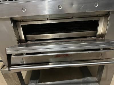 Zanolli and middle by marshals Pizza Over with stands
