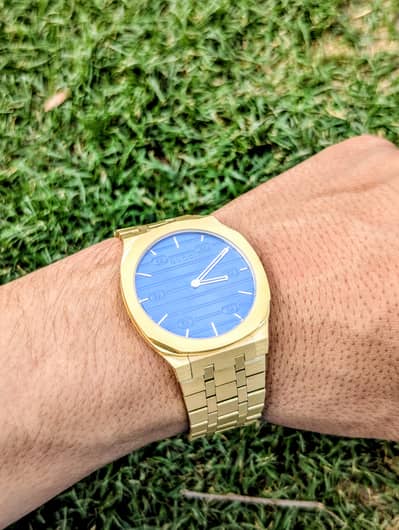GUCCI 25H gold plated with green dial extra slim