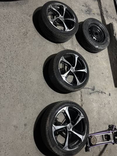 Low profit alloy rim with new tyers