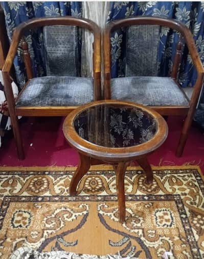 2 wooden chairs with table