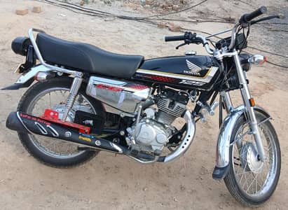 Honda 125 Self start (Silver and black)