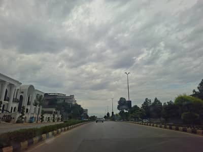500 SquareYard heighted plot with back view open In Sector C DHA phase 2 islamabad