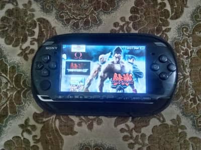 PSP 40 GAMES INSTALLED WITH CHARGER AND COVER
