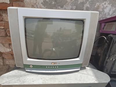 This is a vintage LG CRT television with a silver and green casing.