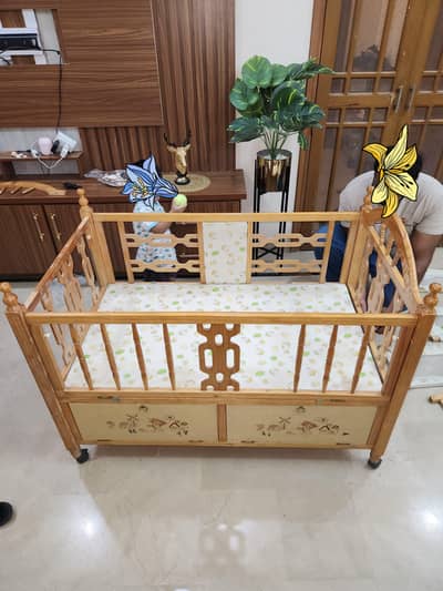 Baby cot with wooden swing with mattress. Baby crib, Nursery cot, cot,