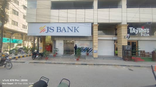 Showroom Commercial Investment Expected Rental Income: 13,50,000 per month MAin Road Facing Oppsite Naheed Super Mart 3-floor showroom in a New Project