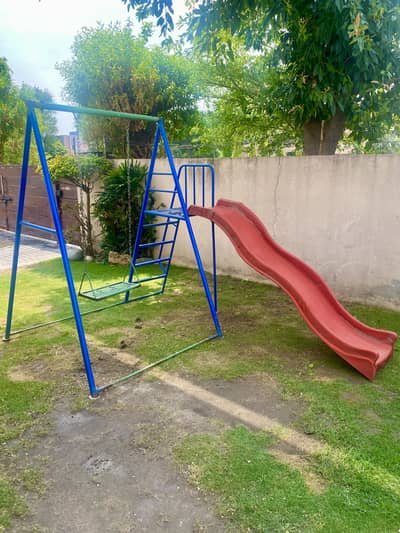 Outdoor kids slide and swing