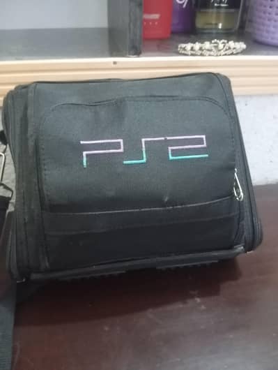 Ps2 for sale with original limited edition handcarry in original comdi
