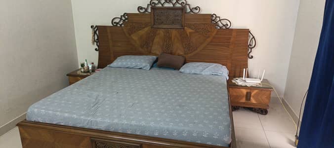 bed set with side tables and dressing
