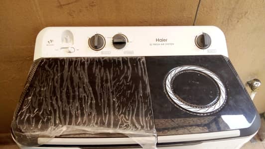 slightly used haier washing machine