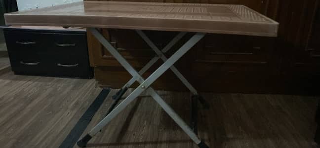 Plastic folding table