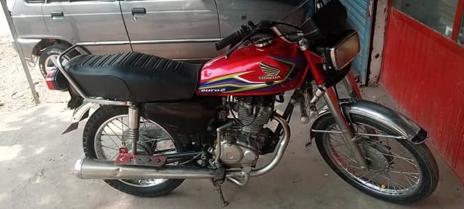 Honda 125 model 2013 location muzaffarabad 03169239366