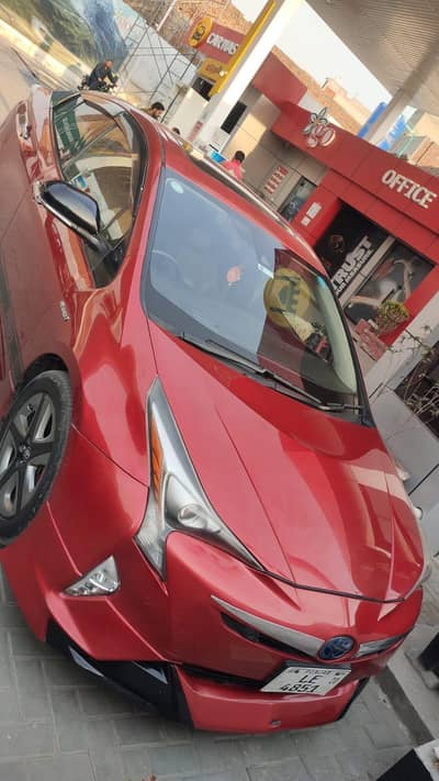 Prius 2020 red color new condition 3 owner sides shower urgent sale