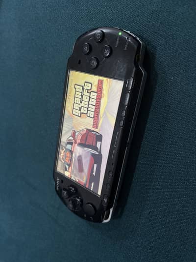 PSP 3000 Black with 64gb card and charger