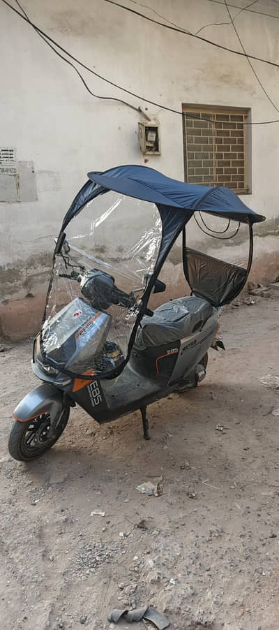 electric bike scooty with umbrella shade