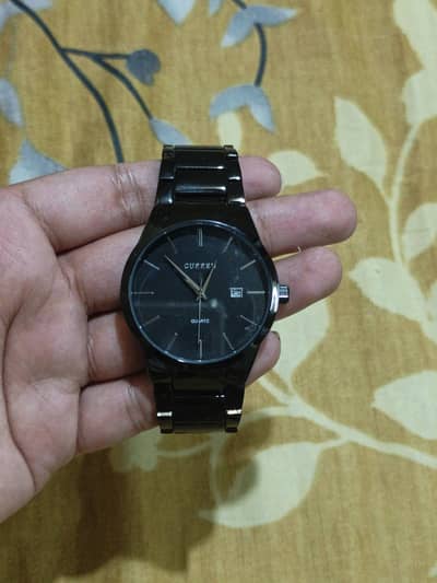 black stainless watch Curren Pakistani brand