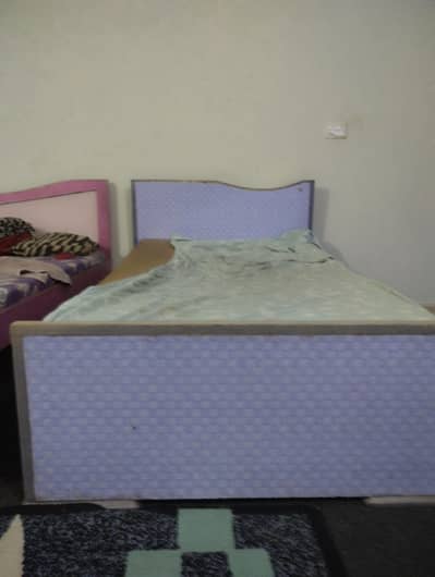3 wooden beds with 3 mattresses . demand of Each pair is 9k