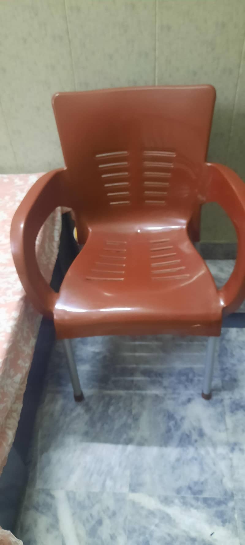 2 plastic chairs 1