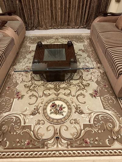 Drawing room sofa set with center table and two wooden chairs