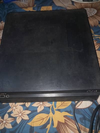 PlayStation 4 Slim with 3 controllers and 3 CDs