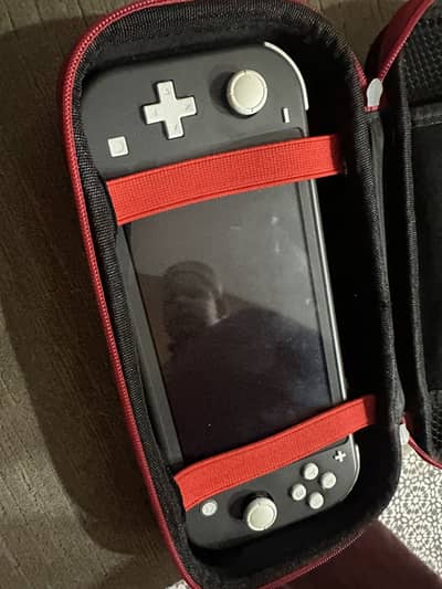 Nintendo Switch Lite plus 5 games