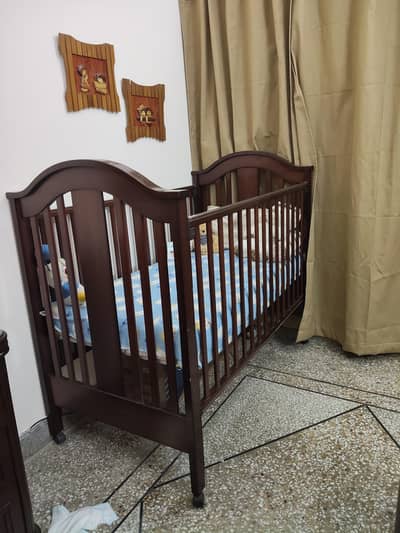 High-quality imported baby cot, made in Taiwan (not Pakistani made).