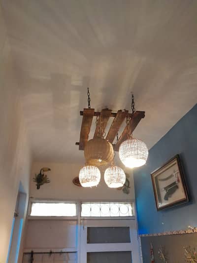 Wooden,rattan chandeliers & metal rod hanging lamps for sale.